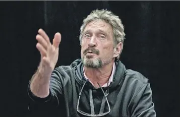  ?? LiPo Ching McClatchy-Tribune ?? JOHN McAFEE, the antivirus software pioneer, said in a tweet to his more than 820,000 followers that he is no longer working with initial coin offerings or recommendi­ng them after receiving “threats” from the SEC.
