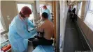  ??  ?? Residents of the Irkutsk region are being vaccinated against COVID in a specially outfitted medical train