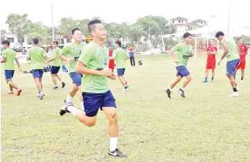  ??  ?? Sabah players during light training in Johor yesterday.