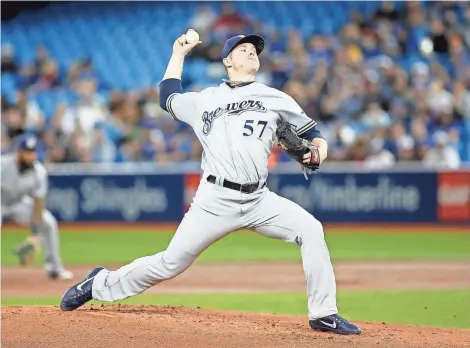  ?? JOHN E. SOKOLOWSKI / USA TODAY SPORTS ?? Chase Anderson blanks the Blue Jays for seven innings on three hits Wednesday night in Toronto.