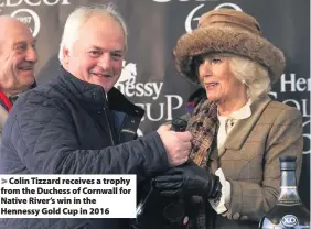  ??  ?? Colin Tizzard receives a trophy from the Duchess of Cornwall for Native River’s win in the Hennessy Gold Cup in 2016