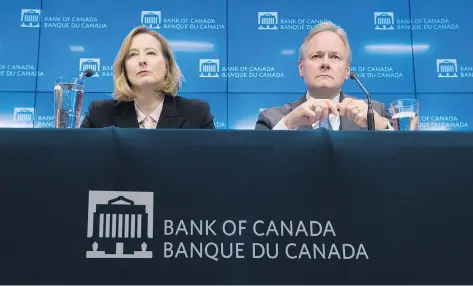  ?? ADRIAN WYLD/THE CANADIAN PRESS ?? In 2009, Canada’s key interest rate was at 1.25 per cent as the nation struggled following the economic collapse. Last week, the Bank of Canada tightened its rate to 1.25 per cent. Should we read anything into that? History shows parallels, writes...