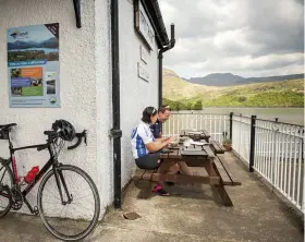  ??  ?? Above left Lunching at the shore of Loch Katrine