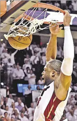  ?? USA TODAY ?? Dwyane Wade stuffs Raptors with 30 points in Game 4 as Heat evens series at two games apiece with victory in Miami.
