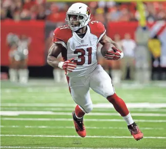  ?? JASON GETZ, USA TODAY SPORTS ?? With 2,118 yards from scrimmage and 20 TDs, David Johnson was a fantasy owner’s dream.