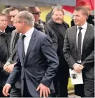  ??  ?? PAYING RESPECTS Celtic manager Brendan Rodgers with Rangers’ Stewart Robertson and Andrew Dickson