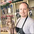  ?? STAFF ARCHIVES ?? Brian Mundy, owner of Schurra’s, shows one of the shop’s chocolate nutcracker­s during the Christmas season in 2007.