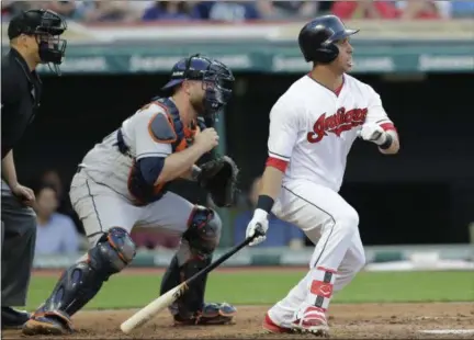  ?? TONY DEJAK — THE ASSOCIATED PRESS ?? The Indians’ Michael Brantley watches his two-run single off Astros starting pitcher Lance McCullers Jr. in the fifth inning.