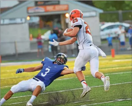  ?? SAM STEWART - DIGITAL FIRST MEDIA ?? Perkiomen Valley’s Justin Jaworski jukes Downingtow­n West’s Cole Zapf on a 53-yard reception during Week 1. Jaworski’s three drops during Week 1never made the box score, but did bother the senior receiver all week. He rebounded by hauling in...