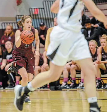  ?? GARY YOKOYAMA HAMILTON SPECTATOR FILE PHOTO ?? Danielle Boiago, pictured with the ball, a one-time standout in women’s basketball for McMaster University, is looking forward to working with male players as an assistant coach with the Niagara River Lions.