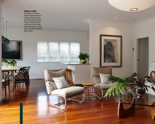  ??  ?? DINING, LIVING Wanting a “beautiful, mature” dining area for hosting dinner parties as well as family meals, Katie combined white walls and an oak table with dark greys, moody artwork and handblown glass lights.