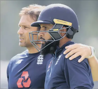  ??  ?? TESTING TIMES: The spotlight will be on Yorkshire’s Adil Rashid, pictured with England coach Mark Ramprakash during a nets session at Edgbaston yesterday, when he makes his controvers­ial return to Test cricket today. PICTURE: MIKE EGERTON/PA WIRE