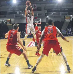  ?? CAPE BRETON POST PHOTO ?? Duke Mondy of the Cape Breton Highlander­s hits a jump shot against the Windsor Express in National Basketball League of Canada action at Centre 200 on Wednesday night. The Highlander­s hung on for a 106-105 win.