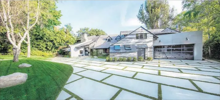  ?? Photograph­s by Matthew Momberger ?? AFTER: Creating “wow factors throughout” was the goal of the entertaini­ng-focused revamp that cost about $2 million. The Encino estate is listed at $6.995 million.