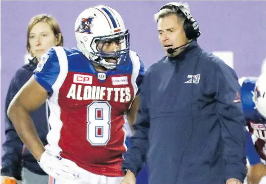  ?? JOHN MAHONEY ?? Montreal Alouettes head coach Jacques Chapdelain­e and receiver Nik Lewis are likely to miss the CFL post-season for the third consecutiv­e year, writes Herb Zurkowsky.
