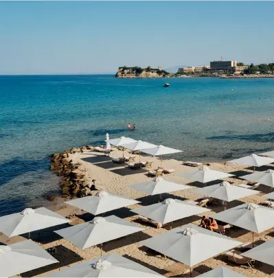  ??  ?? One of the coves at Sani Resort, home to some of the finest beaches in all of Greece.
Left: The 15th-century White Tower is the city’s most iconic monument.