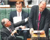  ??  ?? OLD MATES: Then PM John Howard with his then deputy Tim Fischer in Parliament in 1997.
