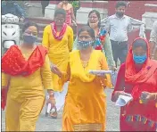  ?? HT PHOTO ?? Candidates coming out of a centre after the exam in Prayagraj on Sunday