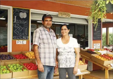  ?? SUSAN McIVER/Special to The Herald ?? Fresh produce at reasonable prices is the motto of Partap and Kam Sandhu, who own S.S. Orchard at 960 By-Pass Rd. in Keremeos. The couple sell only fruit and vegetables they have grown on their property.