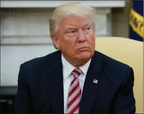  ?? Associated Press ?? Trump: President Donald Trump talks to reporters in the Oval Office of the White House in Washington. Trump, in an apparent warning to his fired FBI director, said Friday, May 12, 2017, that James Comey had better hope there are no "tapes" of their...