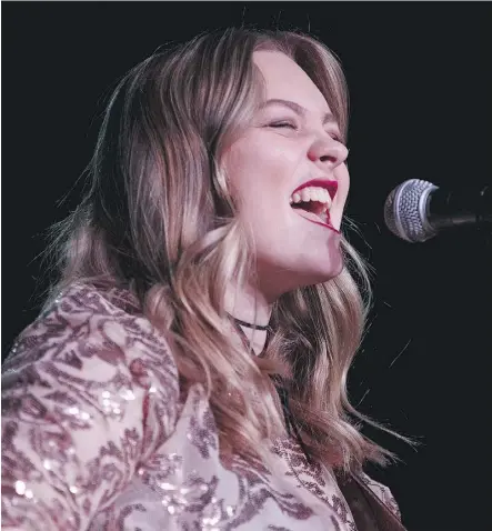  ?? IAN KUCERAK ?? Olivia Rose, a country music singer from Elk Point, performs Friday at the Needle Vinyl Tavern as the Alberta Gaming and Liquor Commission announced a policy change allowing underage performers in lounges and bars.