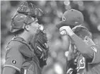  ?? MATT MARTON/USA TODAY SPORTS ?? Reds catcher Tyler Stephenson, left, and starting pitcher Sonny Gray meet in the fourth inning on Wednesday.