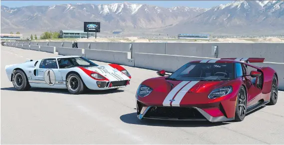  ?? PHOTOS: FORD ?? The focus of the 2017 Ford GT, shown to the right of the original GT40, is on aerodynami­c design, not cramming horsepower and torque under the hood.