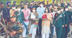  ?? ?? Daughters of CDS General Bipin Rawat arrive to immerse the ashes of their parents in the Ganga, in Haridwar on Saturday.