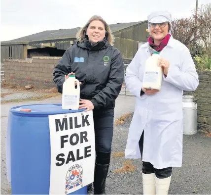  ??  ?? > Dairy farmer Emma Robinson, right, with her local Farming Connect developmen­t officer, Catherine Smith, at Grosmont Wood Farm. Emma recently won one of Lantra’s prestigiou­s Land Based Learner of the Year awards