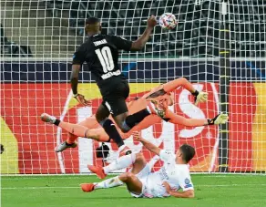  ??  ?? Slick shot: Borussia Moenchengl­adbach’s Marcus Thuram scoring the first goal against Real Madrid in their Champions League group match. — Reuters