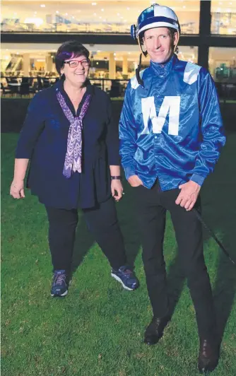  ?? HUNTED: Winx owner Debbie Kepitis with the mare’s jockey Hugh Bowman. Picture: STEPHEN COOPER ??