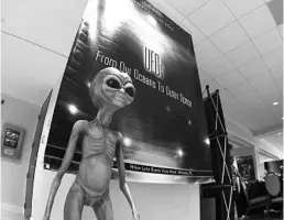  ?? JORDAN KRUMBINE/STAFF PHOTOGRAPH­ER ?? An alien statue welcomes mankind to the annual MUFON symposium. The Mutual UFO Network held its annual symposium at the Hilton in Lake Buena Vista this weekend.