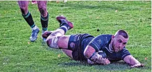  ?? Bernie Rowlands ?? ●●Brendan Berry finishes off a well worked try