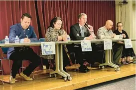  ?? LIA RUSSELL/STAFF ?? Candidates for the 2nd Congressio­nal District, Del. Harry Bhandari,from left; Sia Kyriakakos; Baltimore County Executive Johnny Olszewski Jr.; Clint Spellman Jr. and Jessica Sjoberg, at a forum at the Towson library.