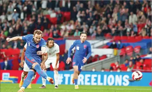  ?? AFP ?? Harry Kane kicks the winning 78th minute penalty against Switzerlan­d on Saturday.