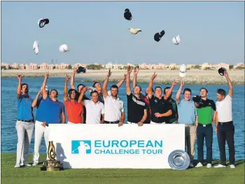  ??  ?? The 15 players who secured their European Tour card places for 2019 celebrate after the Road to Ras Al Khaimah event in the United Arab Emirates.