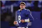  ?? Adam Hunger / Associated Press ?? Quarterbac­k Daniel Jones and the Giants visit the Cowboys on Thanksgivi­ng afternoon.
