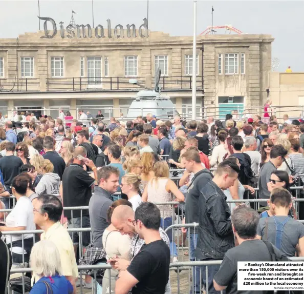  ?? Nicholas Hayman/SWNS ?? Banksy’s Dismaland attracted more than 150,000 visitors over its five-week run and brought an economic boost of an estimated £20 million to the local economy