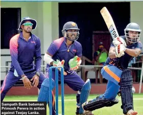  ??  ?? Sampath Bank batsman Primosh Perera in action against Teejay Lanka.