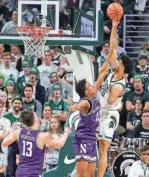  ?? JUNFU HAN/DETROIT FREE PRESS ?? MSU senior forward Malik Hall had perhaps his finest all-around game with 15 points and a career-high 17 rebounds against Northweste­rn.