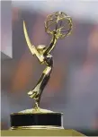  ?? (Robyn Beck/AFP via Getty Images/TNS) ?? AN EMMY statuette is seen on the red carpet before guests arrive for the 71st Emmy Awards in Los Angeles in 2019.