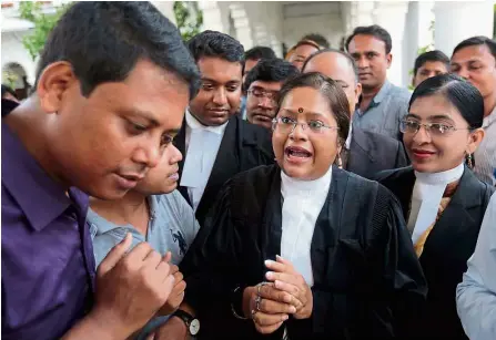  ??  ?? It’s final: Prosecutor turin Afroz (centre) talking to the media outside the supreme Court after the review petition against the death sentence of Mir Quashem was dismissed in Dhaka, Bangladesh. — AP