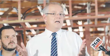  ?? Picture: GARY RAMAGE ?? VISION SPLENDID: Prime Minister Scott Morrison says if you have a go, you’ll get a go – what Townsville needs is a plan to use the Australia Singapore Comprehens­ive Strategic Partnershi­p as a launchpad for further growth.