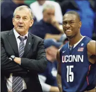  ?? Mel Evans / Associated Press ?? Jim Calhoun, left, and Kemba Walker led UConn on a magical run to the national title 10 years ago this week.