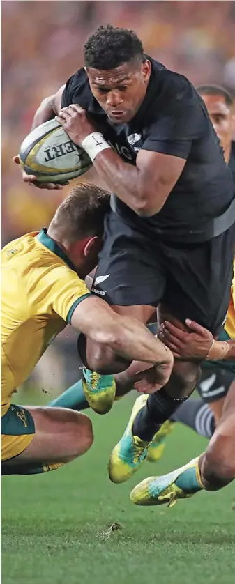  ?? Photo: Zimbio ?? All Blacks wing Waisake Naholo takes on Wallabies’ Bernard Foley’s tackle at the Olympic Stadium in Sydney, Australia on August 18, 2018. Naholo scored two tries as the All Blacks won 38-13.