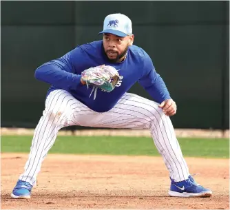  ?? JOHN ANTONOFF/SUN-TIMES ?? The Cubs signed first baseman Dominic Smith (above) and outfielder David Peralta (below) to minor-league deals with invitation­s to spring training last week. Both are coming off surgery.