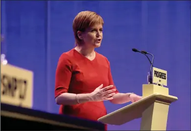  ??  ?? First Minister Nicola Sturgeon delivers her speech about equal pay to the SNP conference at the SEC in Glasgow