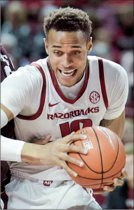  ?? NWA Democrat-Gazette/CHARLIE KAIJO ?? Arkansas sophomore forward Daniel Gafford became the 11th Razorback to earn first-team AllSEC honors when teams selected by the league coaches and members of the media were announced Tuesday. Gafford is averaging 17.0 points, 8.7 rebounds and 2.1 blocks per game.