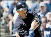  ?? AP/CHRIS O’MEARA ?? (above) to an already potent lineup that includes Aaron Judge may give the New York Yankees their most impressive set of sluggers since Roger Maris and Micky Mantle.