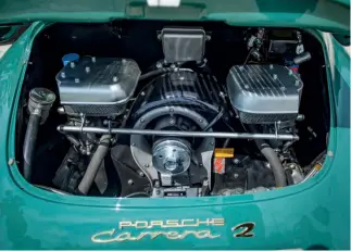  ??  ?? Below: The heart of the beast – 2.0-litre four-cam motor likes to rev and is far stronger than its earlier roller-bearing siblings. The sound at wide open throttle is glorious